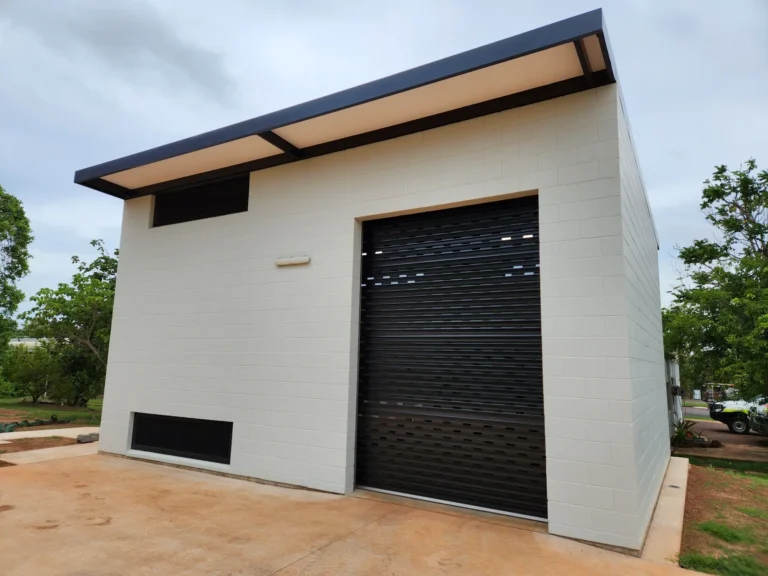 Modern building with black roller door