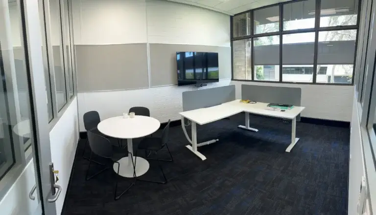 Modern meeting room with table and chairs