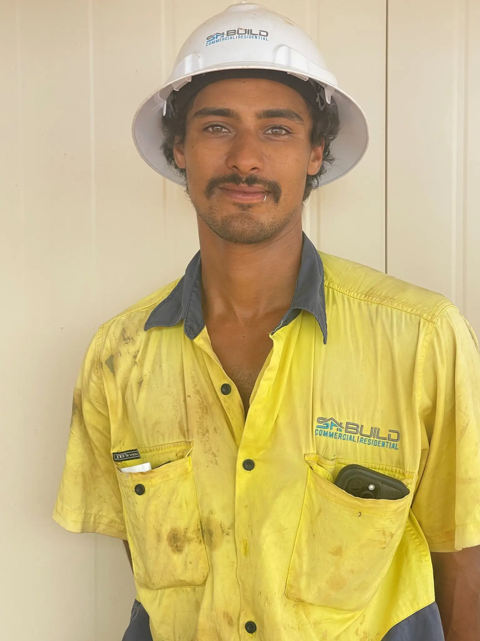 Construction worker in hard hat and hi-vis shirt