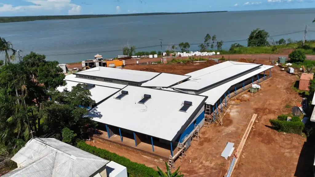 Aerial view of riverside building under construction